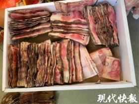 近50万现金受潮变脆饼，吹风机吹干需谨慎